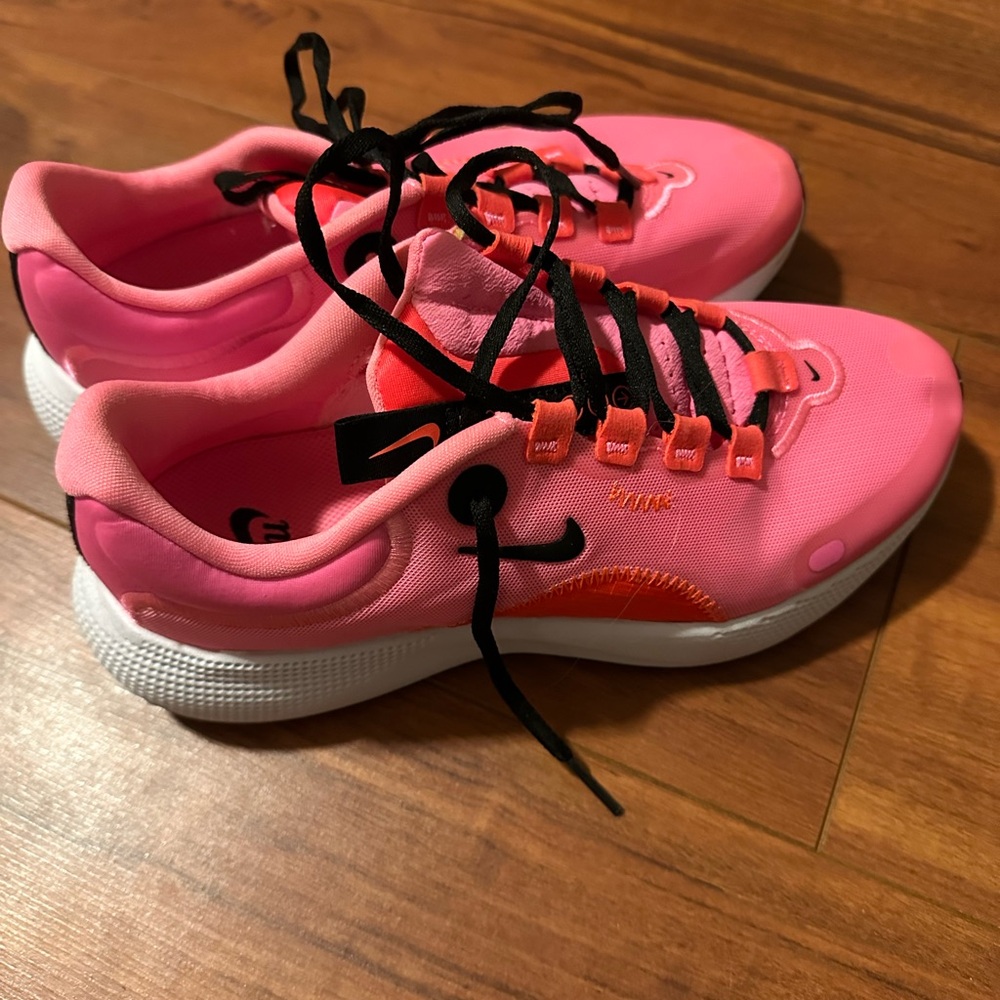 Pink and red Nike reacts